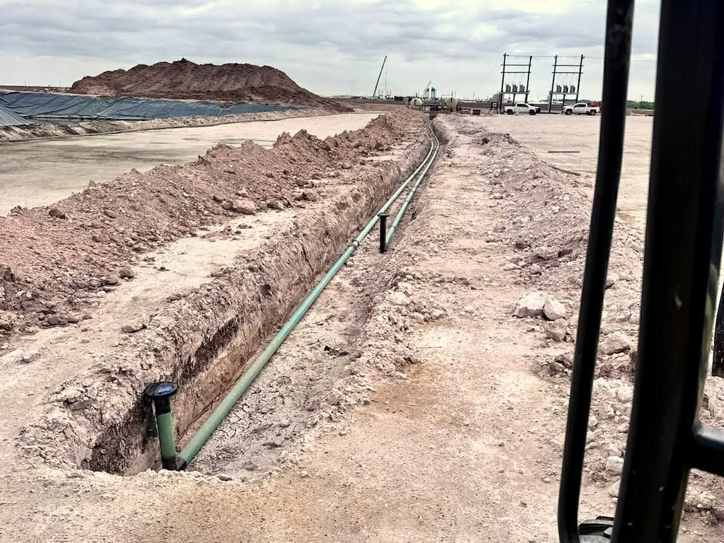 Recently dug trench with backhoe