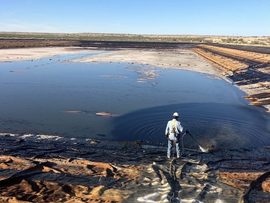 Crew member at spill containment site