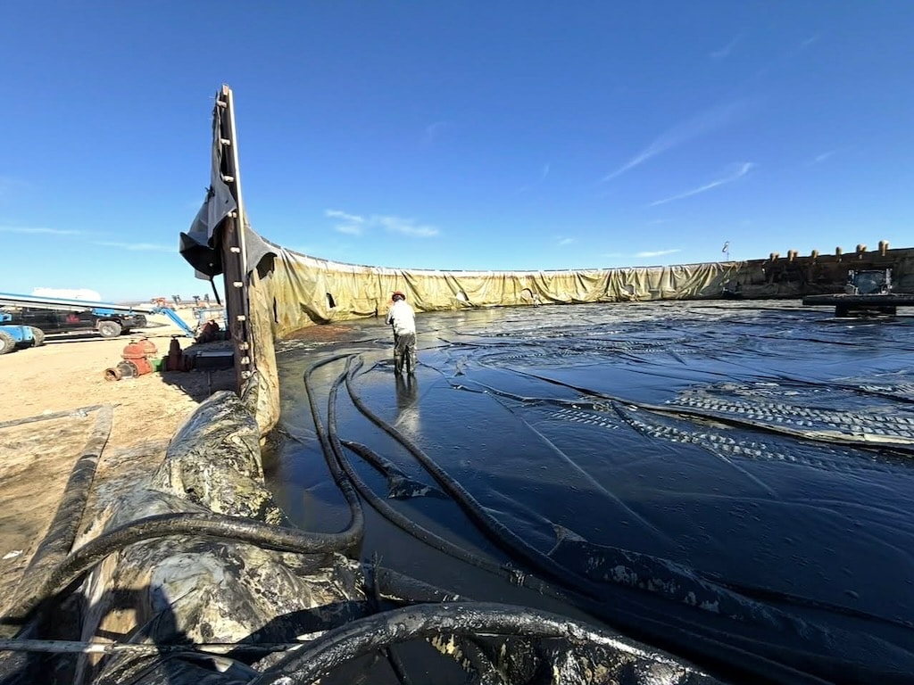 Washing out open tank