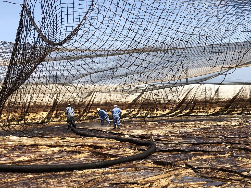 Washing out open tank