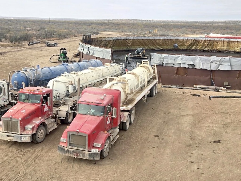 Javelina vacuum trucks at spill containment site