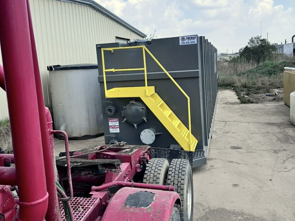 Javelina winch truck unloading tank