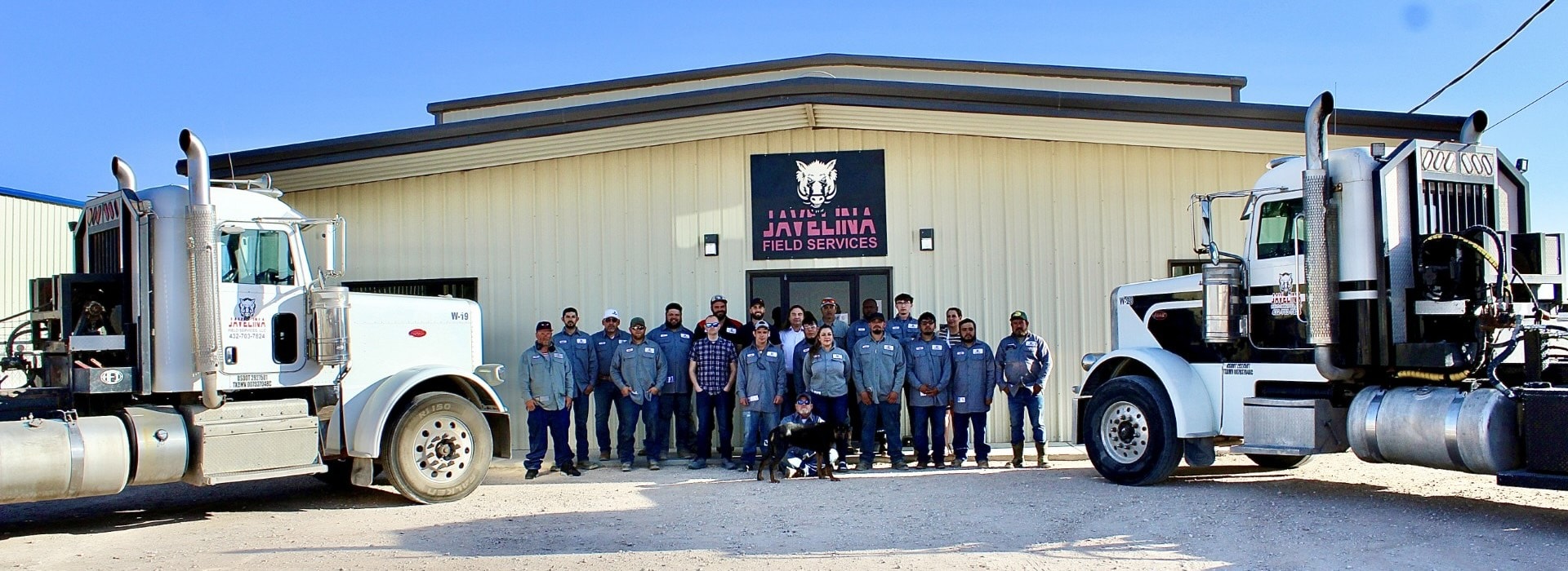 Javelina Field Services employees standing outside of company headquarters